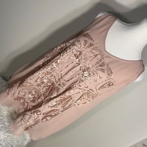 Blush colored, V-neck tank top with sequins